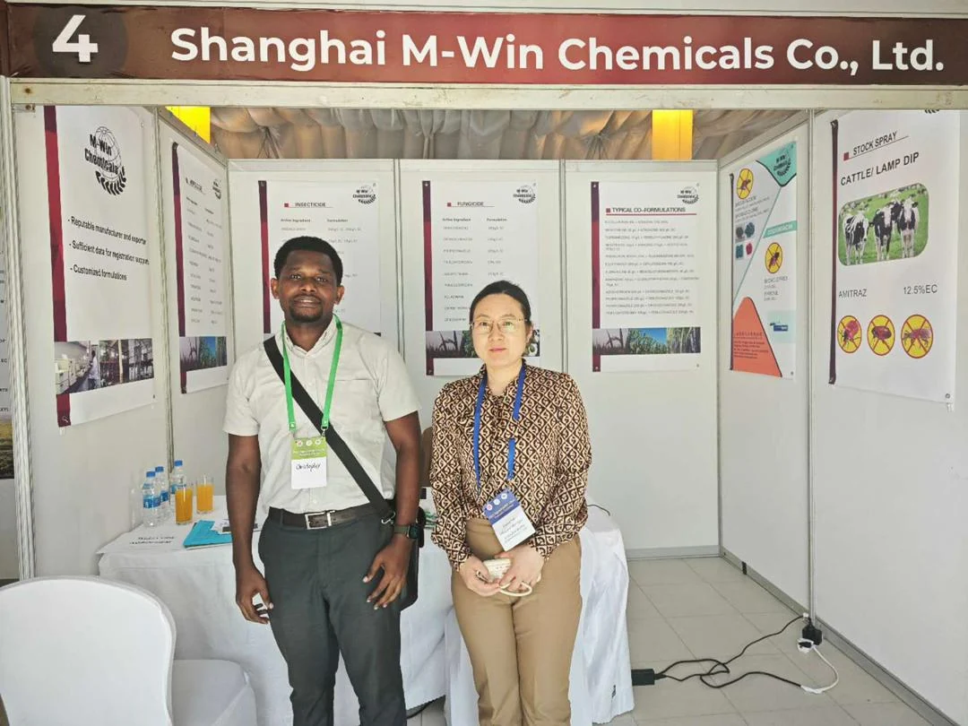 Chris Mbena Agro representative meeting an international agrochemical supplier at an agricultural trade exhibition